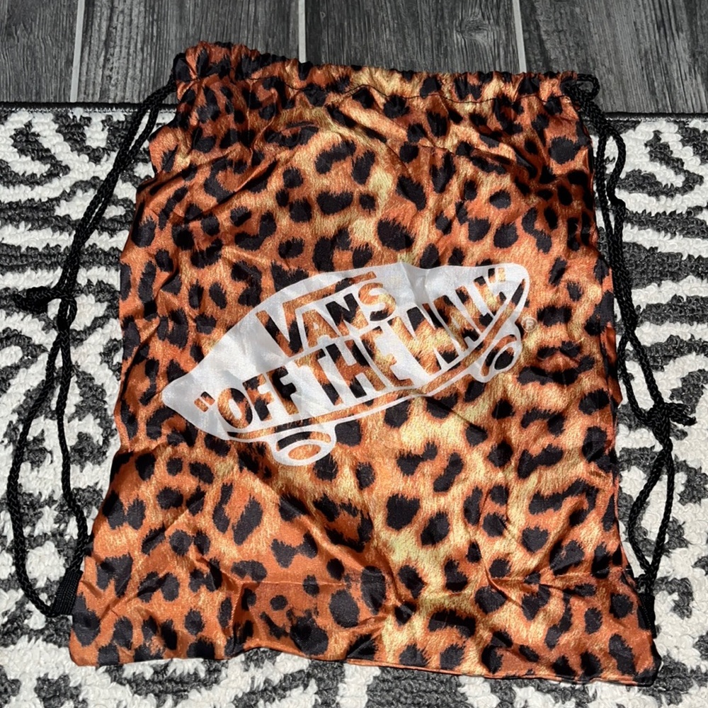 Vans “off the wall” draw string cheetah bag